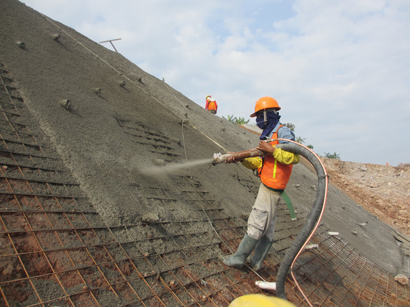 What are the advantages of dry mix shotcrete?
